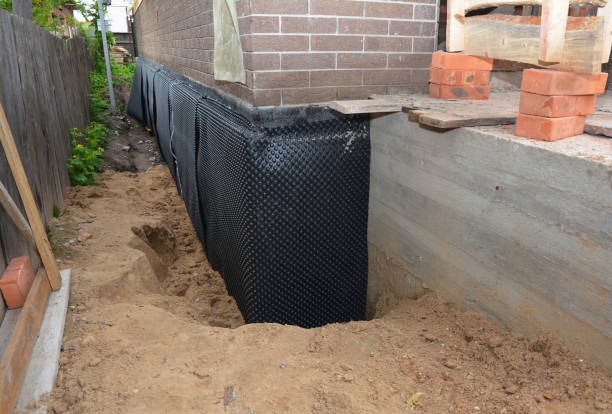 Happy homeowners after waterproofing job in Parlin